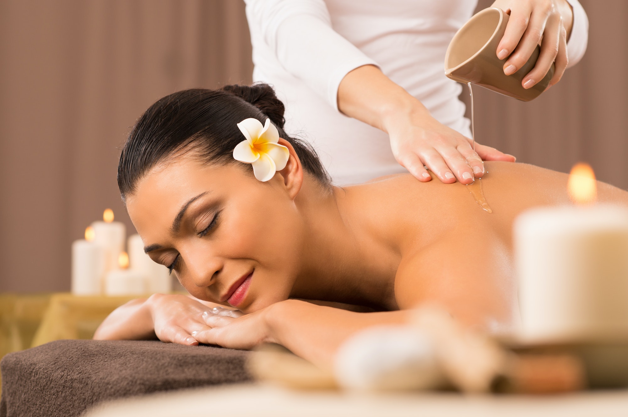 Woman Having A Back Oil Massage